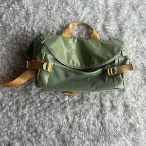 Calpak Green Terra sling bag